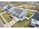 Aerial view of home with landscaped yard, modern siding, and spacious driveway at 856 Parker Ln, Westfield, IN 46074