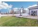 Spacious backyard with wooden deck, lawn, and white fence that provides a private outdoor space at 856 Parker Ln, Westfield, IN 46074
