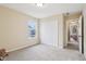 Neutral bedroom featuring a closet, window, and carpeted flooring at 856 Parker Ln, Westfield, IN 46074