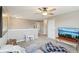 Upper-level bonus room featuring a comfortable seating area, television, and neutral carpeting at 856 Parker Ln, Westfield, IN 46074