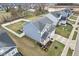 Charming two-story home featuring manicured landscaping, a cozy front porch, and an inviting driveway at 856 Parker Ln, Westfield, IN 46074