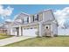 Charming two-story home with a stone facade and attached garage at 856 Parker Ln, Westfield, IN 46074