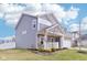 Charming two-story home with a stone facade and a cozy front porch at 856 Parker Ln, Westfield, IN 46074