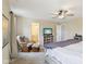 Comfortable main bedroom featuring a ceiling fan, TV, and attached bathroom at 856 Parker Ln, Westfield, IN 46074