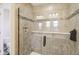Walk-in shower featuring sleek glass doors and modern tile design at 856 Parker Ln, Westfield, IN 46074
