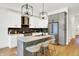 Well-equipped kitchen with stainless steel appliances, ample counter space, and bar seating at 1020 Calvary St, Indianapolis, IN 46203