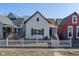 Charming home featuring white picket fence, inviting curb appeal, and a classic design at 1129 Church St, Indianapolis, IN 46225