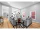 Bright and airy living room with hardwood floors, modern decor, and plenty of natural light at 1129 Church St, Indianapolis, IN 46225