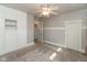 Cozy bedroom with carpet floors and a built-in closet and storage at 117 N Leland St, Fortville, IN 46040