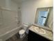 A clean bathroom with a tub, vanity, and modern fixtures provides a relaxing space at 1195 Andromeda Dr, Franklin, IN 46131