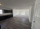 An open-concept living area combines kitchen, dining, and living, offering a harmonious flow and lots of light at 1195 Andromeda Dr, Franklin, IN 46131