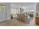 Light and airy dining area with water views, window seating, and an open floor plan, perfect for entertaining at 12561 Marina View Dr, Indianapolis, IN 46256