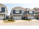 Beautifully maintained multi-story home featuring a three-car garage and attractive blue siding at 12561 Marina View Dr, Indianapolis, IN 46256