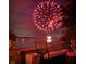A beautiful shot of lakeside fireworks with outdoor seating at 12561 Marina View Dr, Indianapolis, IN 46256