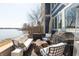 Outdoor patio with comfortable seating and a beautiful lake view at 12561 Marina View Dr, Indianapolis, IN 46256
