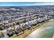 Expansive aerial view of a neighborhood with a lake and many single-Gathering homes on a sunny day at 12635 Braddock Ln, Noblesville, IN 46060