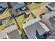 Aerial view of a backyard featuring a storage shed, lawn, and fence at 12635 Braddock Ln, Noblesville, IN 46060