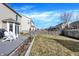 Backyard with deck and seating area, nice landscaping and lawn at 12635 Braddock Ln, Noblesville, IN 46060