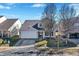 Charming two-story home featuring a well-manicured lawn, attached two-car garage, and inviting front porch at 12635 Braddock Ln, Noblesville, IN 46060