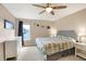 Spacious main bedroom features a ceiling fan, natural light, and neutral decor at 12635 Braddock Ln, Noblesville, IN 46060
