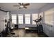 Home gym with exercise equipment and good natural light at 13509 Dunes Dr, Carmel, IN 46032