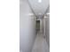 Hallway with recessed lighting offers a view of additional rooms, enhancing flow and accessibility throughout home at 13509 Dunes Dr, Carmel, IN 46032