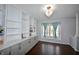 Bright living room featuring a large window and built-in cabinets at 13509 Dunes Dr, Carmel, IN 46032
