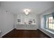 Charming living room with built-in cabinets and large window at 13509 Dunes Dr, Carmel, IN 46032