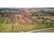 Expansive aerial shot of lot featuring mature trees, trails, and open fields at 15123 E 196Th St, Noblesville, IN 46060