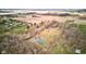 Breathtaking overhead view of property and a peaceful pond area at 15123 E 196Th St, Noblesville, IN 46060