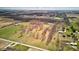 Beautiful aerial perspective of the property with a mix of open fields and wooded areas at 15123 E 196Th St, Noblesville, IN 46060