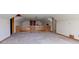 Unfinished attic area with plywood flooring and wood railing offers potential for customization and finishing at 15123 E 196Th St, Noblesville, IN 46060