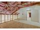 An unfinished attic with exposed rafters and insulation offering flexible possibilities for customization and renovation at 15123 E 196Th St, Noblesville, IN 46060