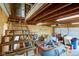 Interior of a large barn featuring unfinished ceiling, stairs, and storage at 15123 E 196Th St, Noblesville, IN 46060