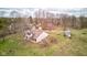 Aerial view of a charming home with a large backyard, barn, and shed at 15123 E 196Th St, Noblesville, IN 46060
