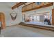 Spacious living room with unfinished floors and upper level access at 15123 E 196Th St, Noblesville, IN 46060