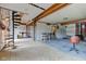 Large room with spiral staircase and unfinished flooring at 15123 E 196Th St, Noblesville, IN 46060