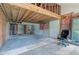 Unfinished living room space with exposed framing and unfinished floors offers a unique opportunity at 15123 E 196Th St, Noblesville, IN 46060