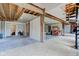 Spacious open concept living area with a spiral staircase and bare wood floors at 15123 E 196Th St, Noblesville, IN 46060