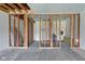 Unfinished room showcasing exposed framing with defined doorways, highlighting the room's potential at 15123 E 196Th St, Noblesville, IN 46060