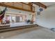 Open-concept living room with exposed beams, and unfinished flooring at 15123 E 196Th St, Noblesville, IN 46060