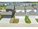 Overhead shot of modern homes featuring attached garages and driveways, perfect for families at 15304 Fairlands Dr, Westfield, IN 46074