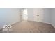 Clean bedroom features neutral carpet, large double door closet and fresh paint at 15304 Fairlands Dr, Westfield, IN 46074