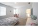 Bedroom with pink accents and carpet, providing a calming and cozy environment at 15304 Fairlands Dr, Westfield, IN 46074