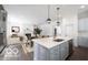 Bright kitchen featuring an open concept with stainless steel appliances, perfect for entertaining guests at 15304 Fairlands Dr, Westfield, IN 46074