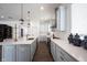 Bright kitchen featuring stainless steel appliances, granite countertops, and ample counter space at 15304 Fairlands Dr, Westfield, IN 46074