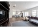 Open concept with living room, kitchen with island, wood floors and lots of natural light at 15304 Fairlands Dr, Westfield, IN 46074