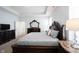 Well-appointed bedroom featuring a large bed, dark wood furniture, and soft lighting at 15304 Fairlands Dr, Westfield, IN 46074