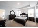 Spacious bedroom with dark wood furnishings, neutral carpet and serene natural light at 15304 Fairlands Dr, Westfield, IN 46074