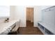 Mudroom features built in seating and workspace with luxury vinyl flooring at 15304 Fairlands Dr, Westfield, IN 46074